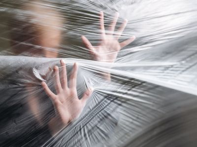 Blurry artistic shot of a person moving through a pose.